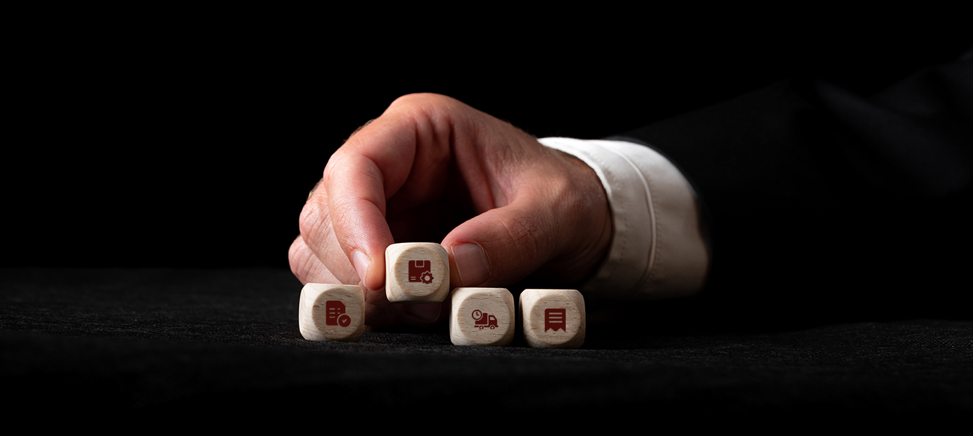 Close view of a business person hand holding a cube having must have features for field service management software